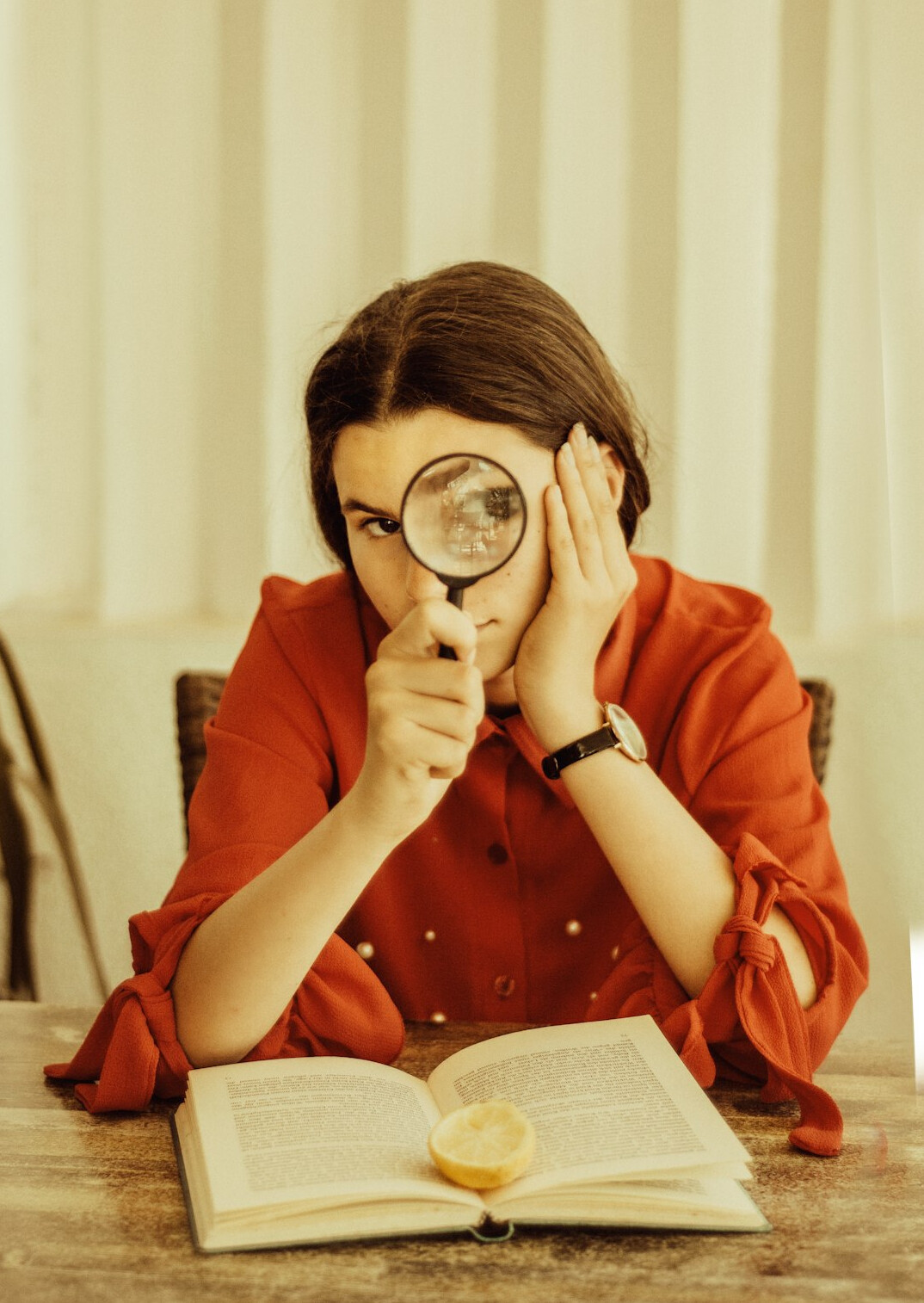 detective reading mystery book