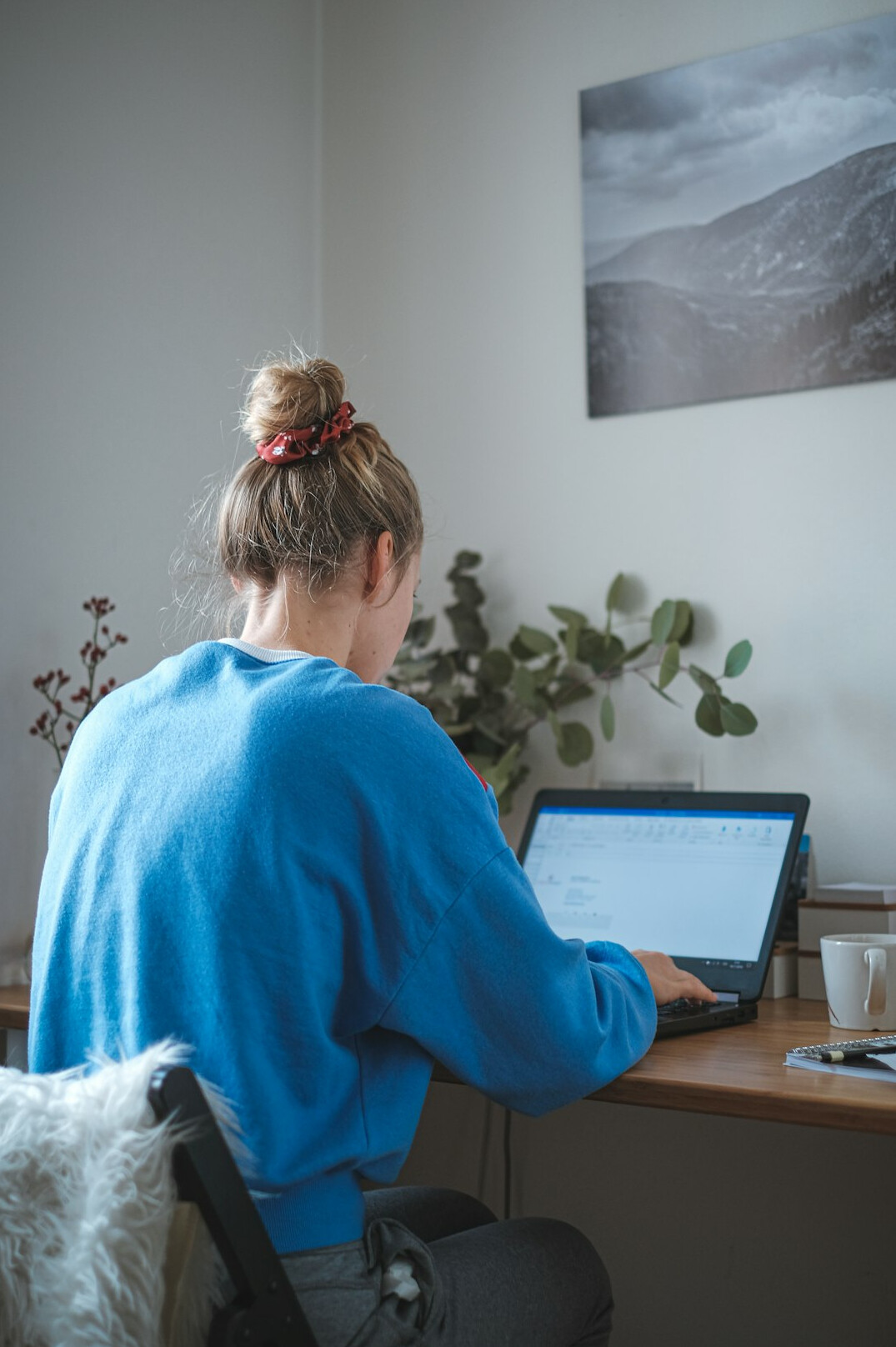person studying at desk